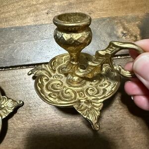 vintage brass candle holder, known as an ornate Scottish floral candleholder